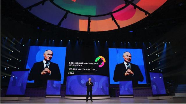 Russia's President Vladimir Putin delivers a speech during the closing ceremony of the 2024 World Youth Festival 